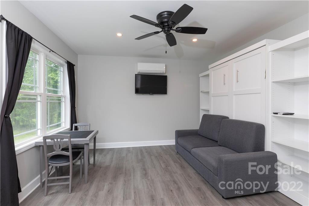 1279 Lake Road Clover, SC 29710 - Photo 21 of 44 a living room with furniture and a flat screen tv