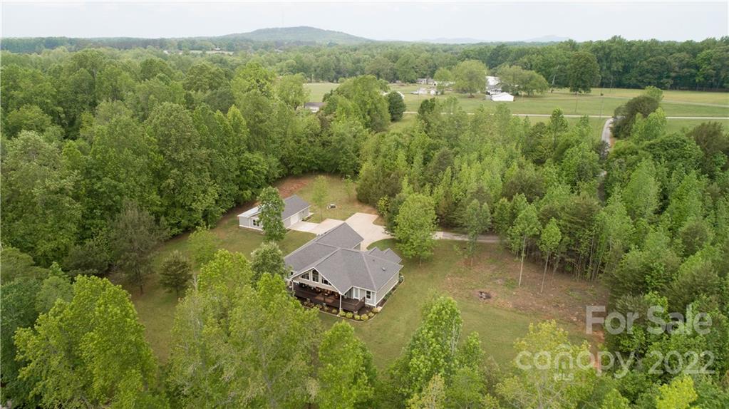 1279 Lake Road Clover, SC 29710 - Photo 25 of 44 a view of a lake with a mountain