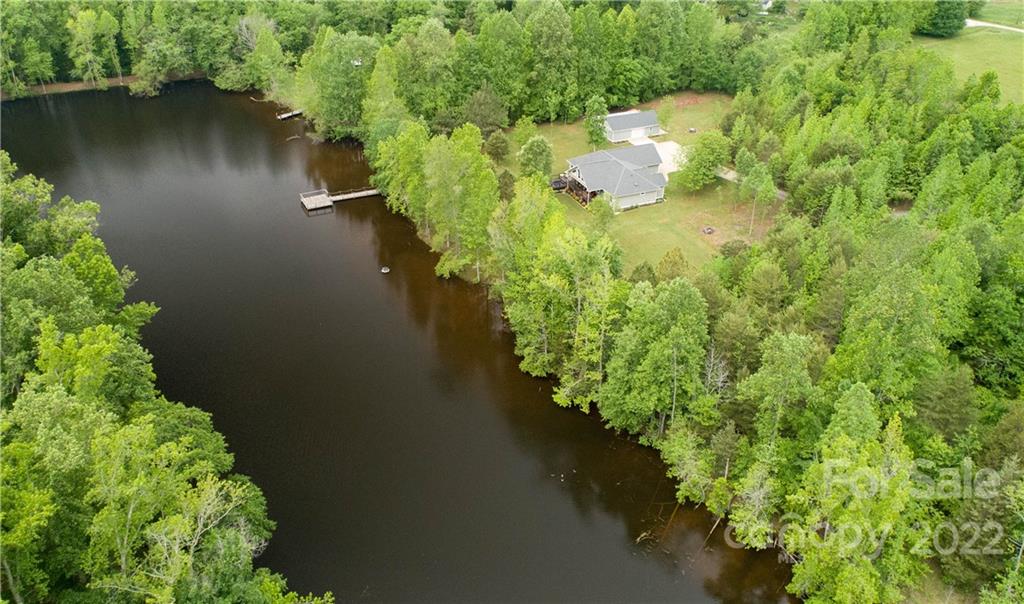 1279 Lake Road Clover, SC 29710 - Photo 27 of 44 an aerial view of a house with pool outdoor seating yard and green space