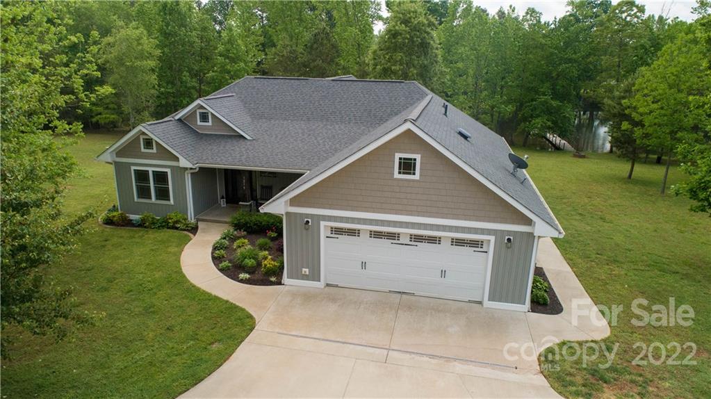 1279 Lake Road Clover, SC 29710 - Photo 39 of 44 a aerial view of a house next to a yard