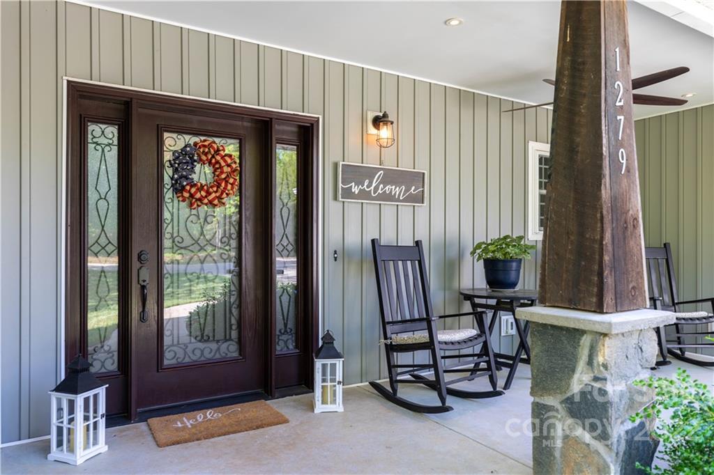 1279 Lake Road Clover, SC 29710 - Photo 6 of 44 a view of a porch with furniture and front door