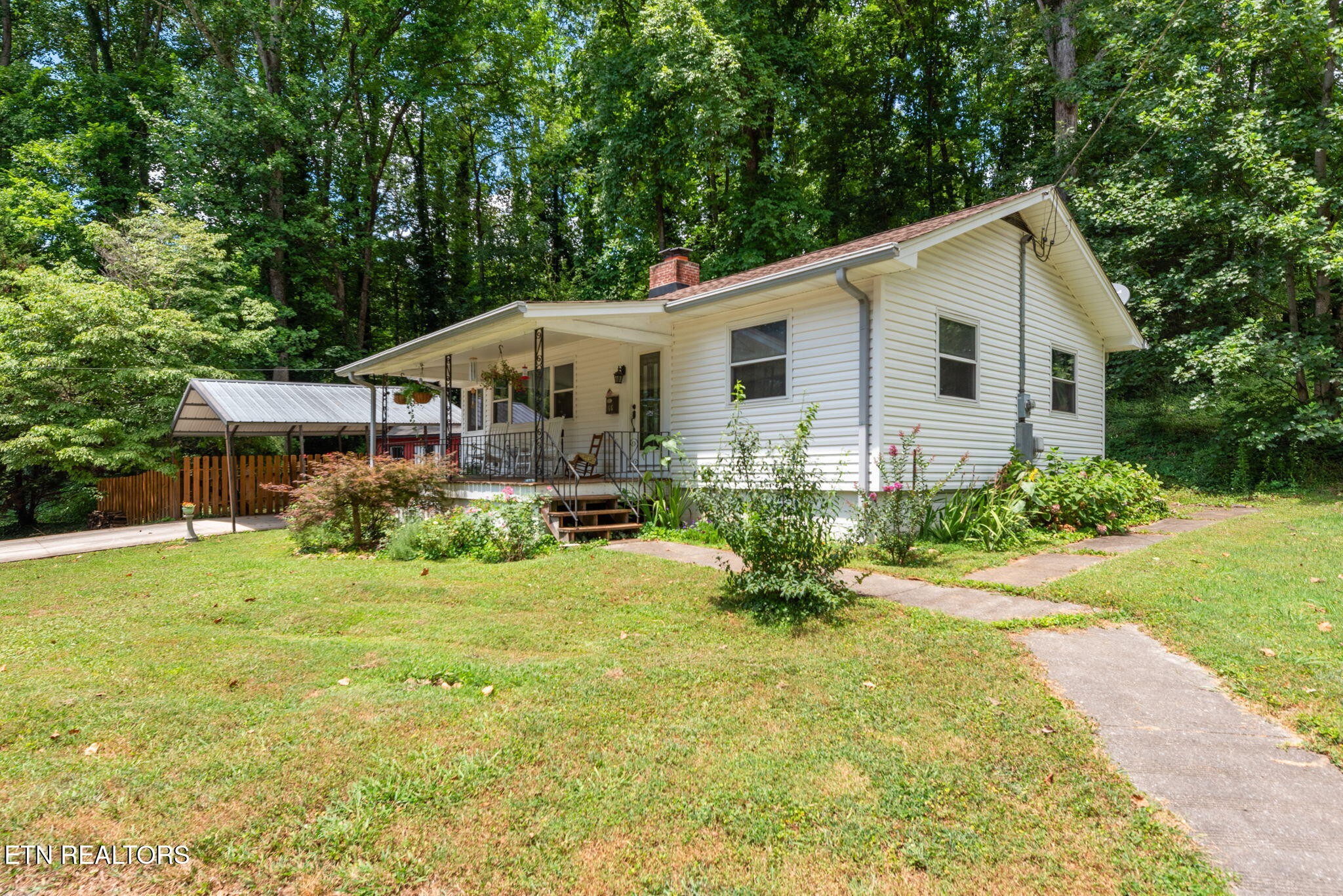 166 Outer Drive Oak Ridge, TN 37830 - Photo 3 of 30 a view of a house with backyard and sitting area