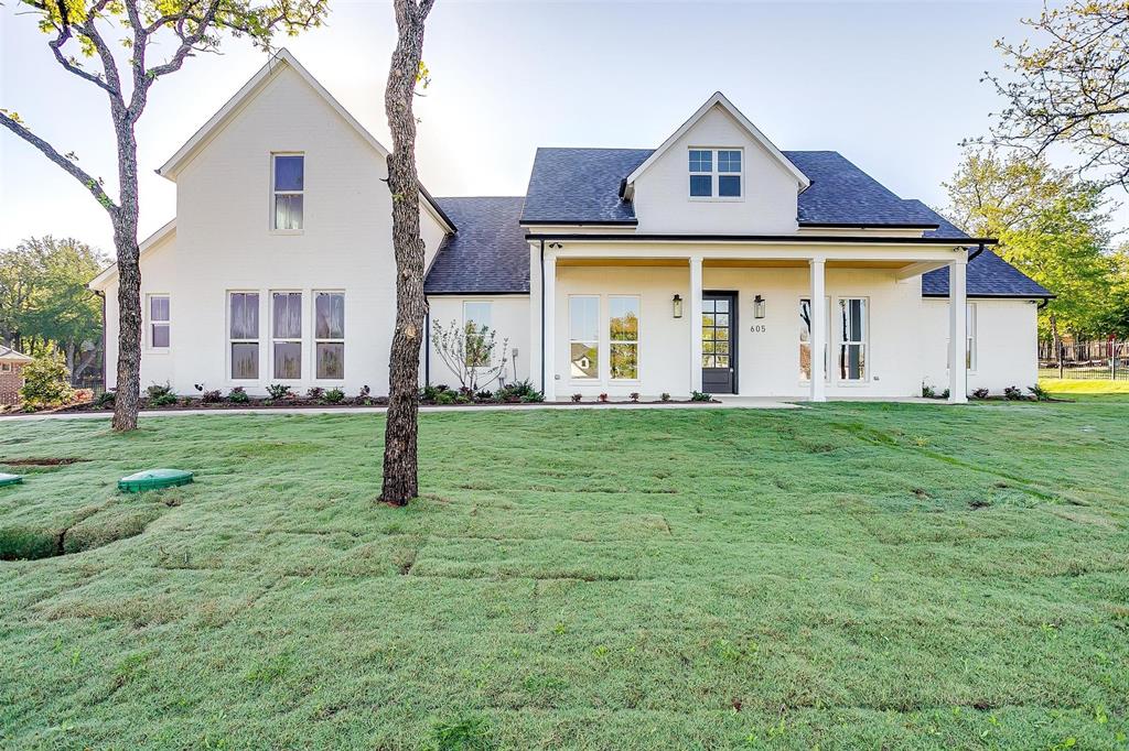 607 Sugartree Drive Lipan, TX 76462 - Photo 1 of 1 a front view of a house with a yard