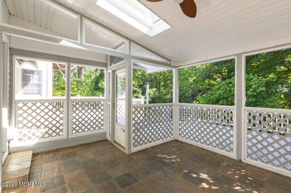 48 Ravine Drive Matawan, NJ 07747 - Photo 26 of 31 Rear Enclosed Porch