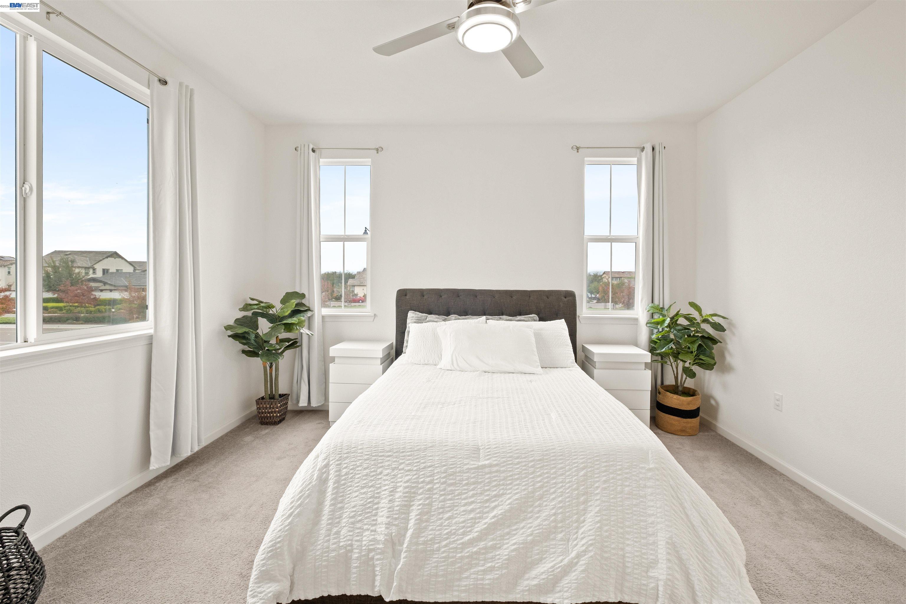 17575 Altair Way Lathrop, CA 95330 - Photo 12 of 29 a bedroom with a bed and window