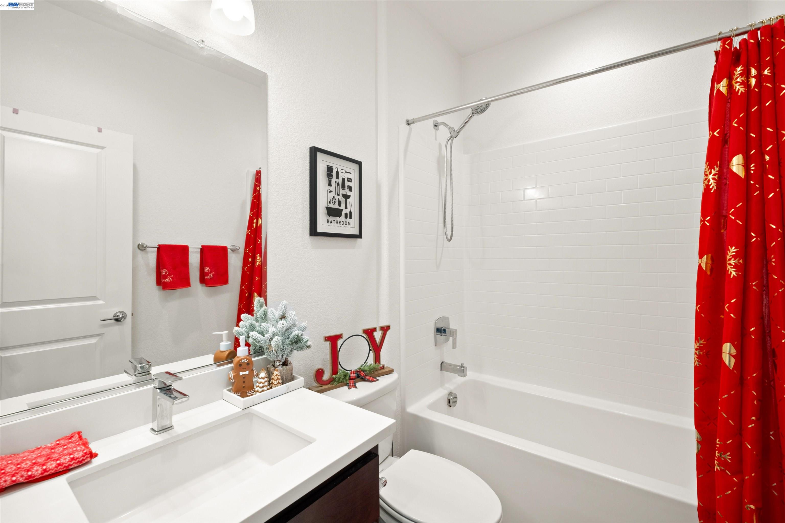17575 Altair Way Lathrop, CA 95330 - Photo 23 of 29 a bathroom with a sink vanity tub and shower