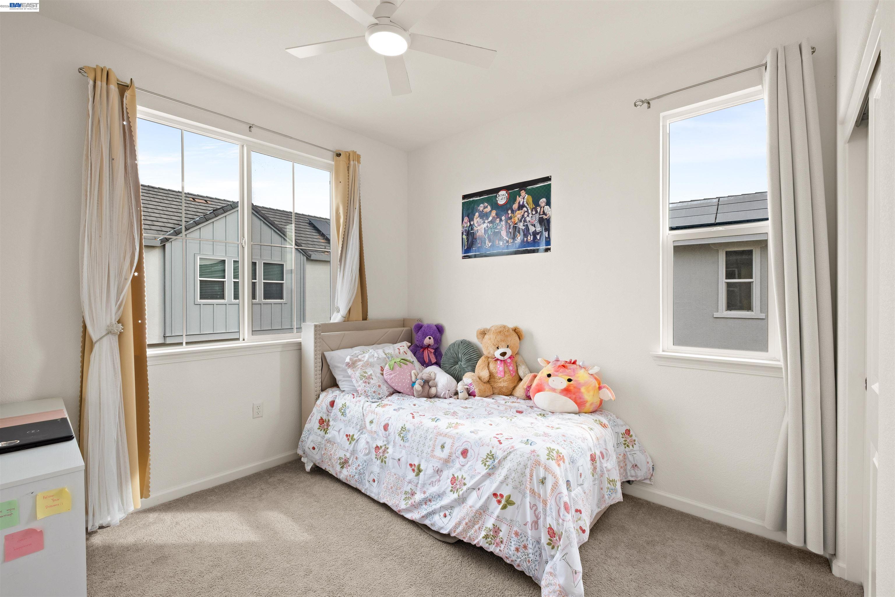 17575 Altair Way Lathrop, CA 95330 - Photo 26 of 29 a bed room with a bed and a window