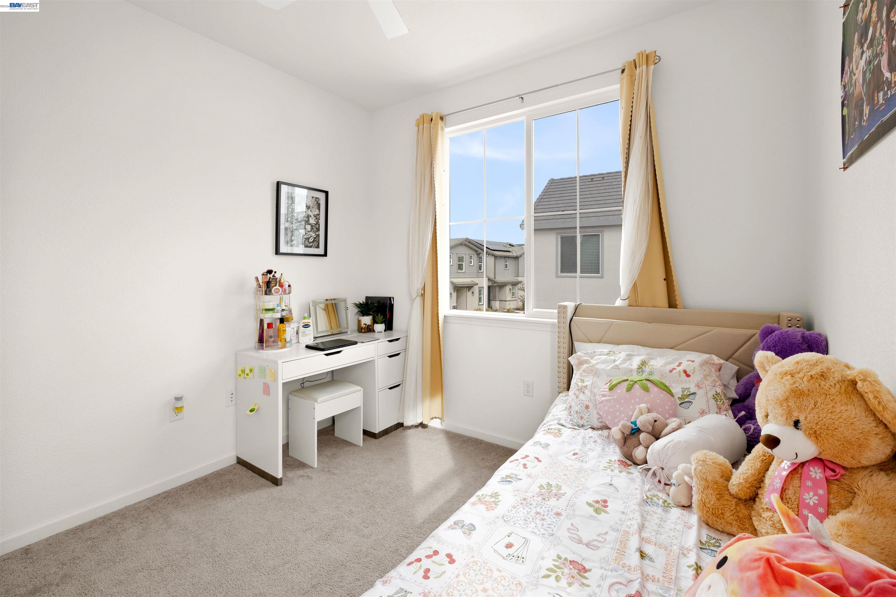 17575 Altair Way Lathrop, CA 95330 - Photo 27 of 29 a bedroom with a bed and a window