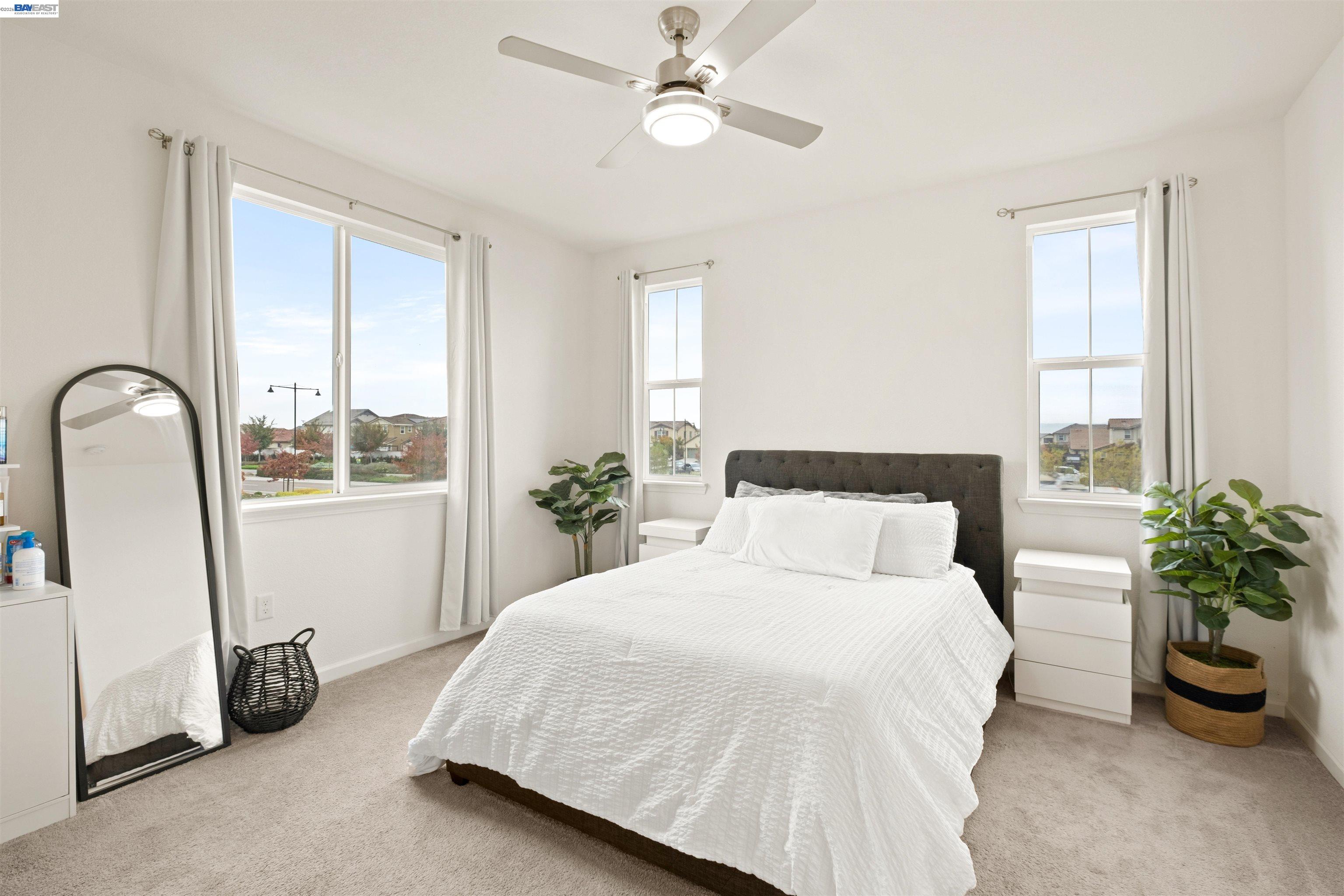 17575 Altair Way Lathrop, CA 95330 - Photo 9 of 29 a bedroom with a bed and a window