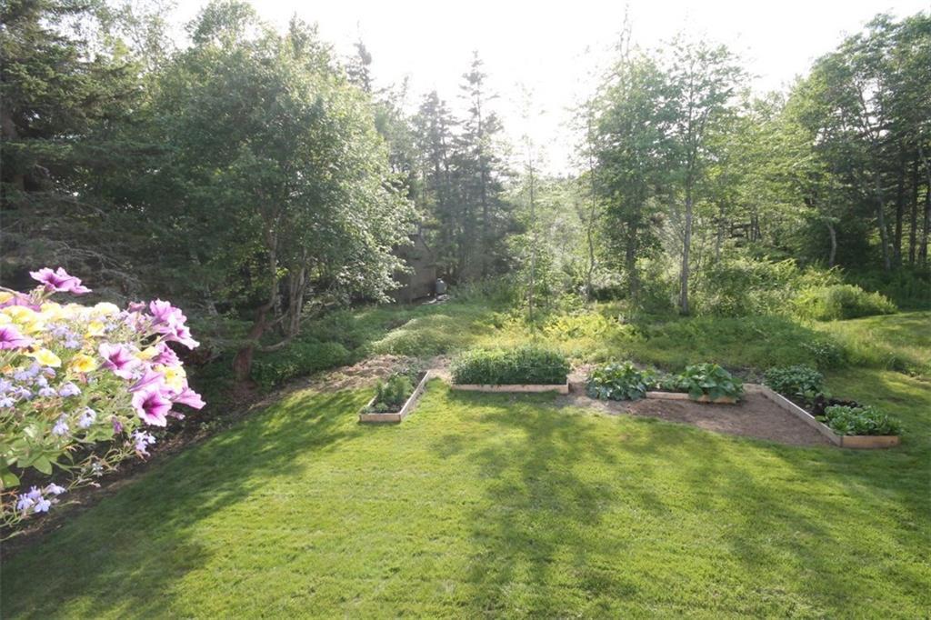 8 Meadow Cove Road East Boothbay, ME 04544 - Photo 24 of 25 Nice, level backyard with raised bed...