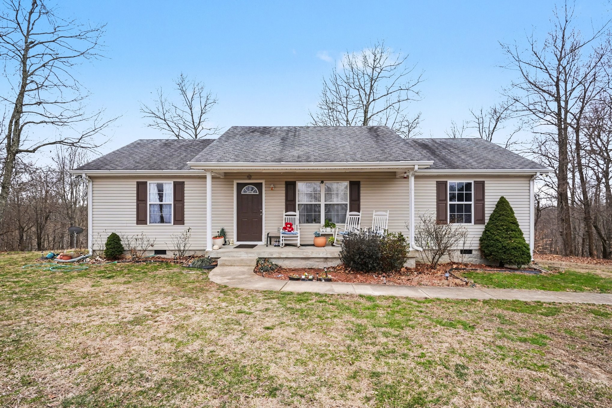 2490 Monte Murrey Road Lewisburg, TN 37091 - Photo 2 of 30 a front view of a house with a garden and porch