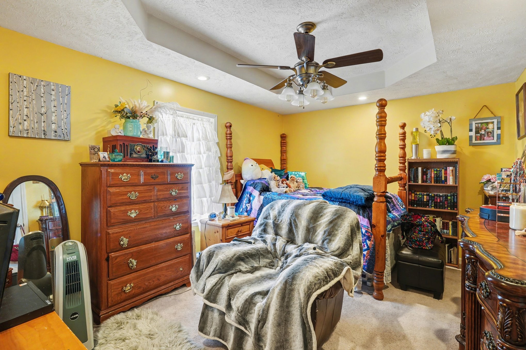 2490 Monte Murrey Road Lewisburg, TN 37091 - Photo 21 of 30 a bedroom with a bed and a chandelier