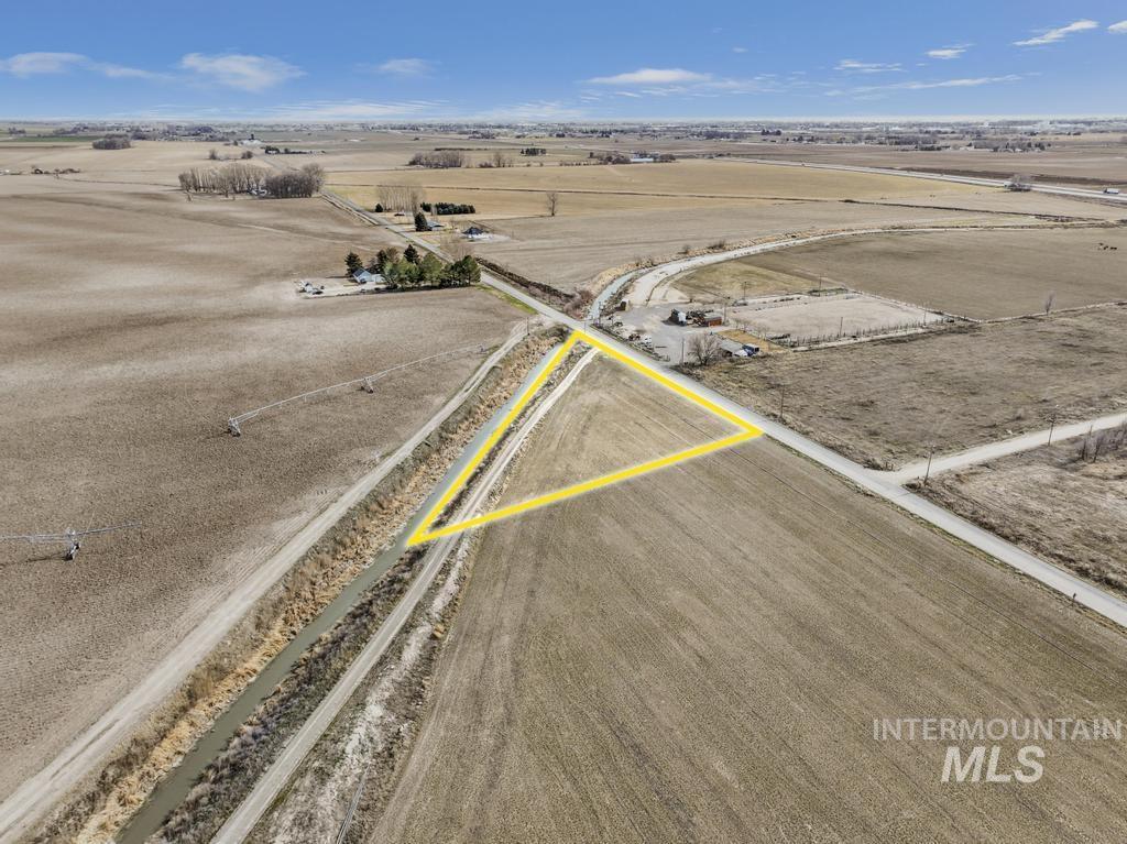 4 300 South Road Paul, ID 83347 - Photo 3 of 14 Aerial view of sparsely populated area featuring property boundaries highlighted