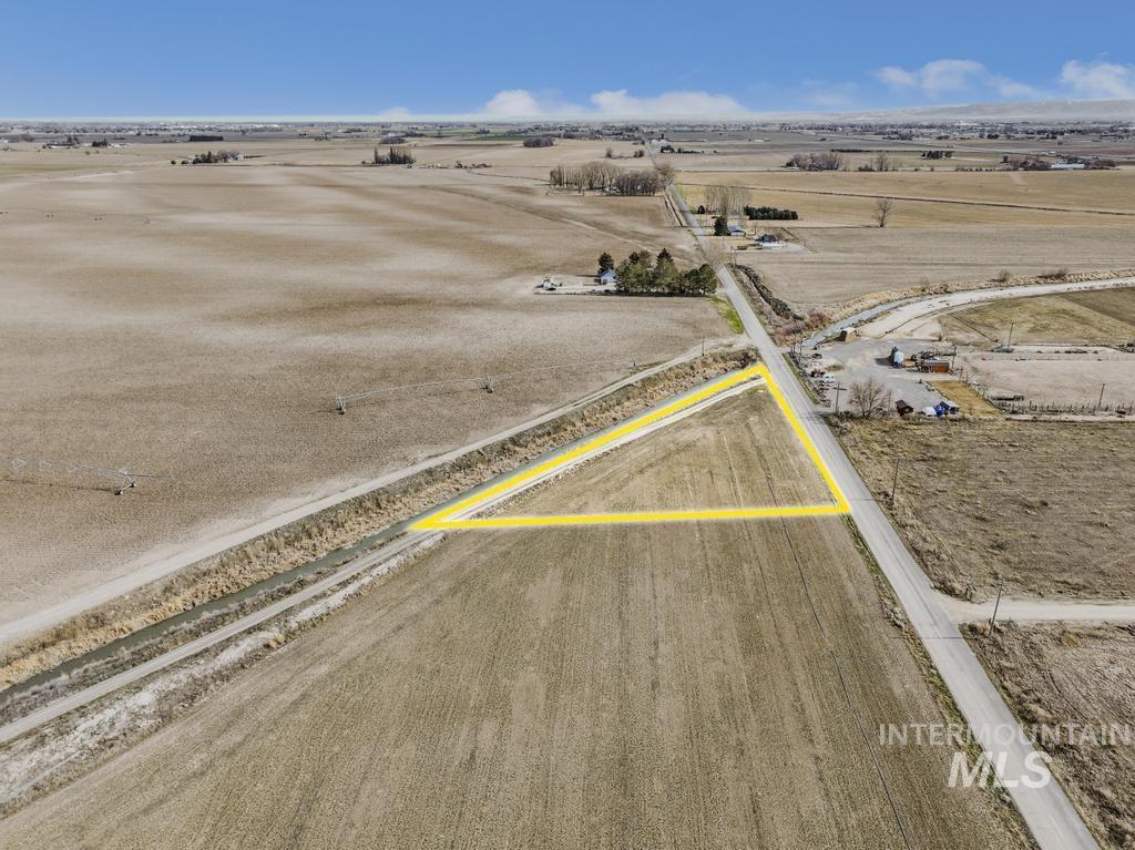 4 300 South Road Paul, ID 83347 - Photo 4 of 14 Aerial view of sparsely populated area with property boundaries highlighted
