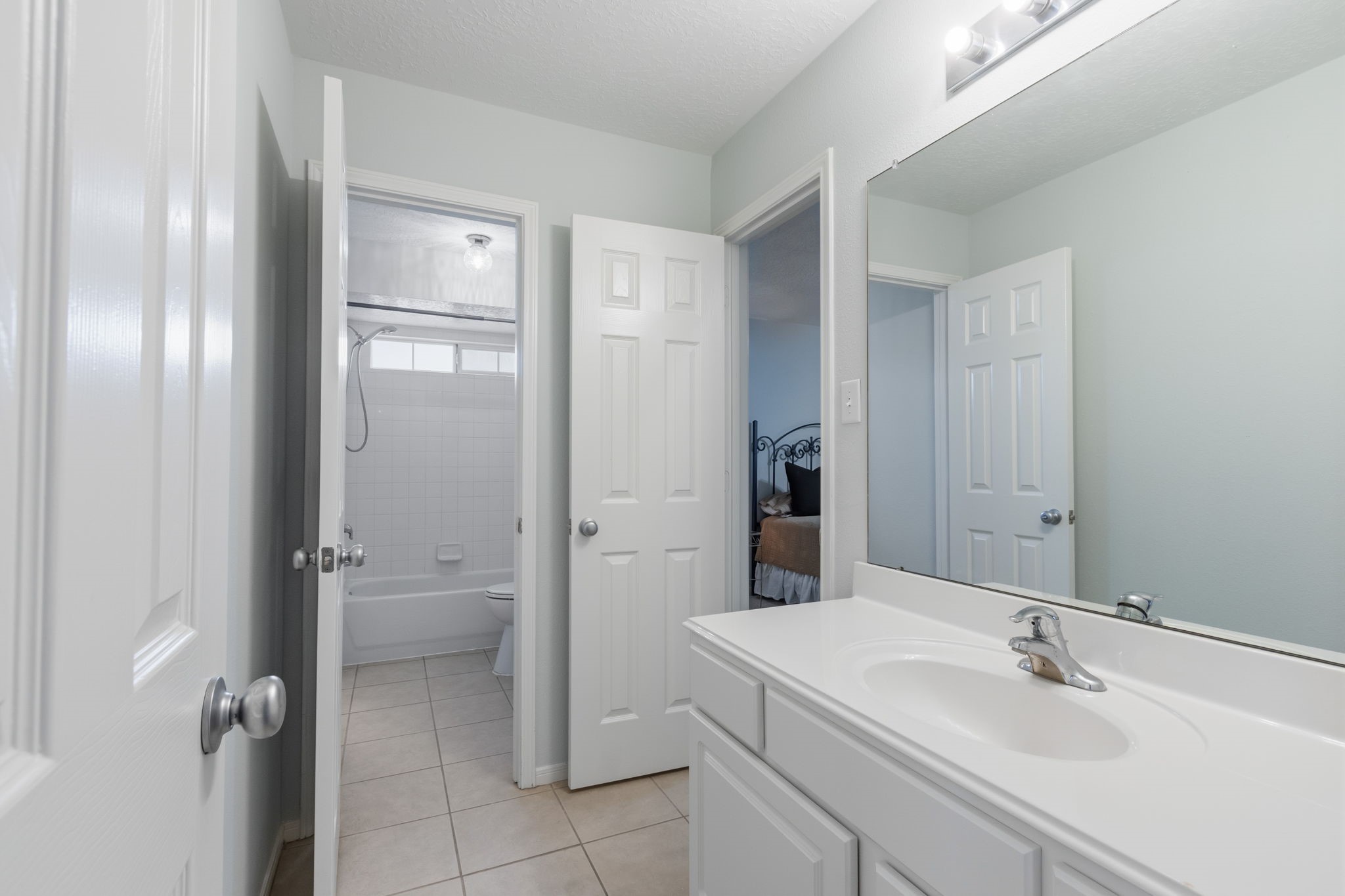 8419 Marchelle Lane Spring, TX 77379 - Photo 23 of 42 a bathroom with a sink toilet and shower