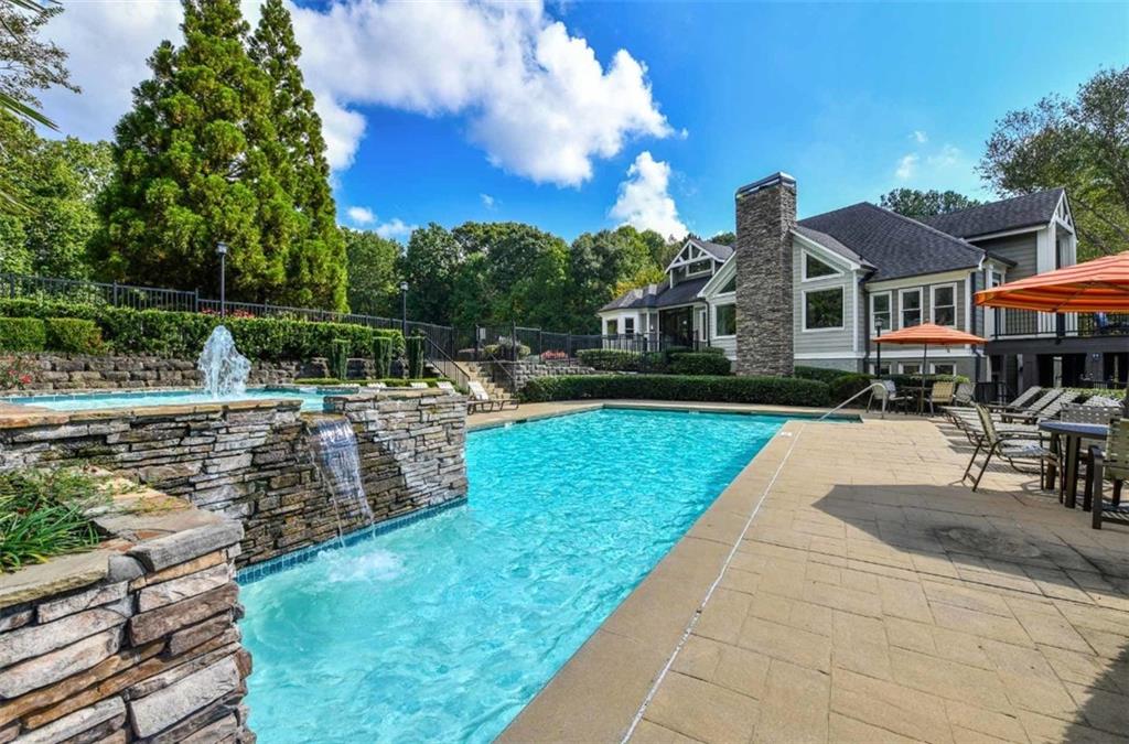 670 Thornton Road, Unit 1006 Lithia Springs, GA 30122 - Photo 19 of 26 a view of a house with a yard
