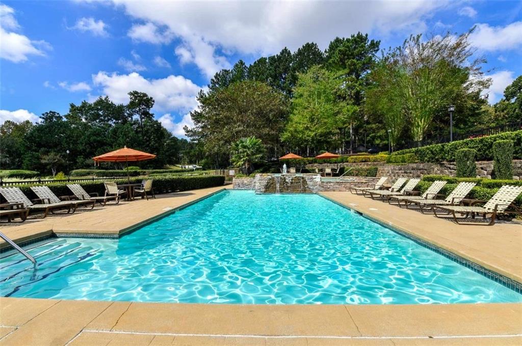 670 Thornton Road, Unit 1006 Lithia Springs, GA 30122 - Photo 23 of 26 a view of swimming pool with chairs
