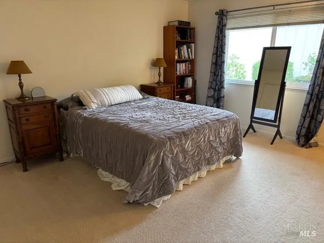 a view of a chairs and table in the patio