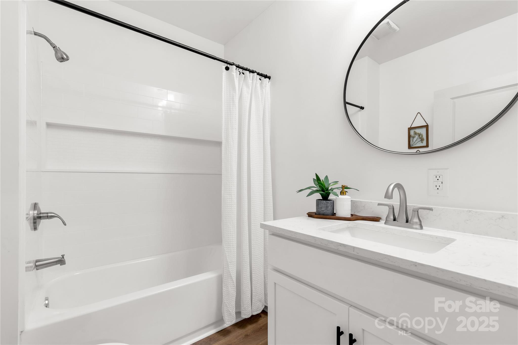 310 Elm Street Lancaster, SC 29720 - Photo 11 of 48 a bathroom with a sink and a mirror