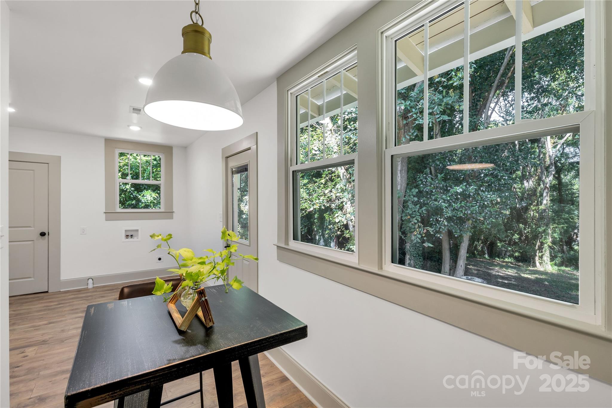 310 Elm Street Lancaster, SC 29720 - Photo 22 of 48 a view of a dining room with furniture window and wooden floor