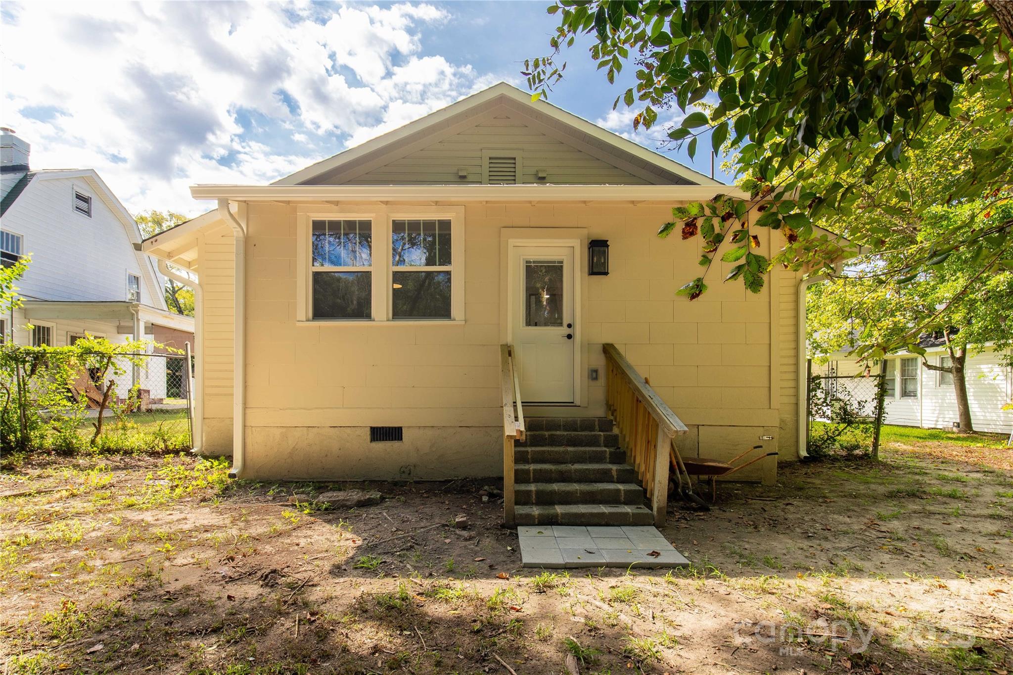 310 Elm Street Lancaster, SC 29720 - Photo 27 of 48 a view of a house with a yard