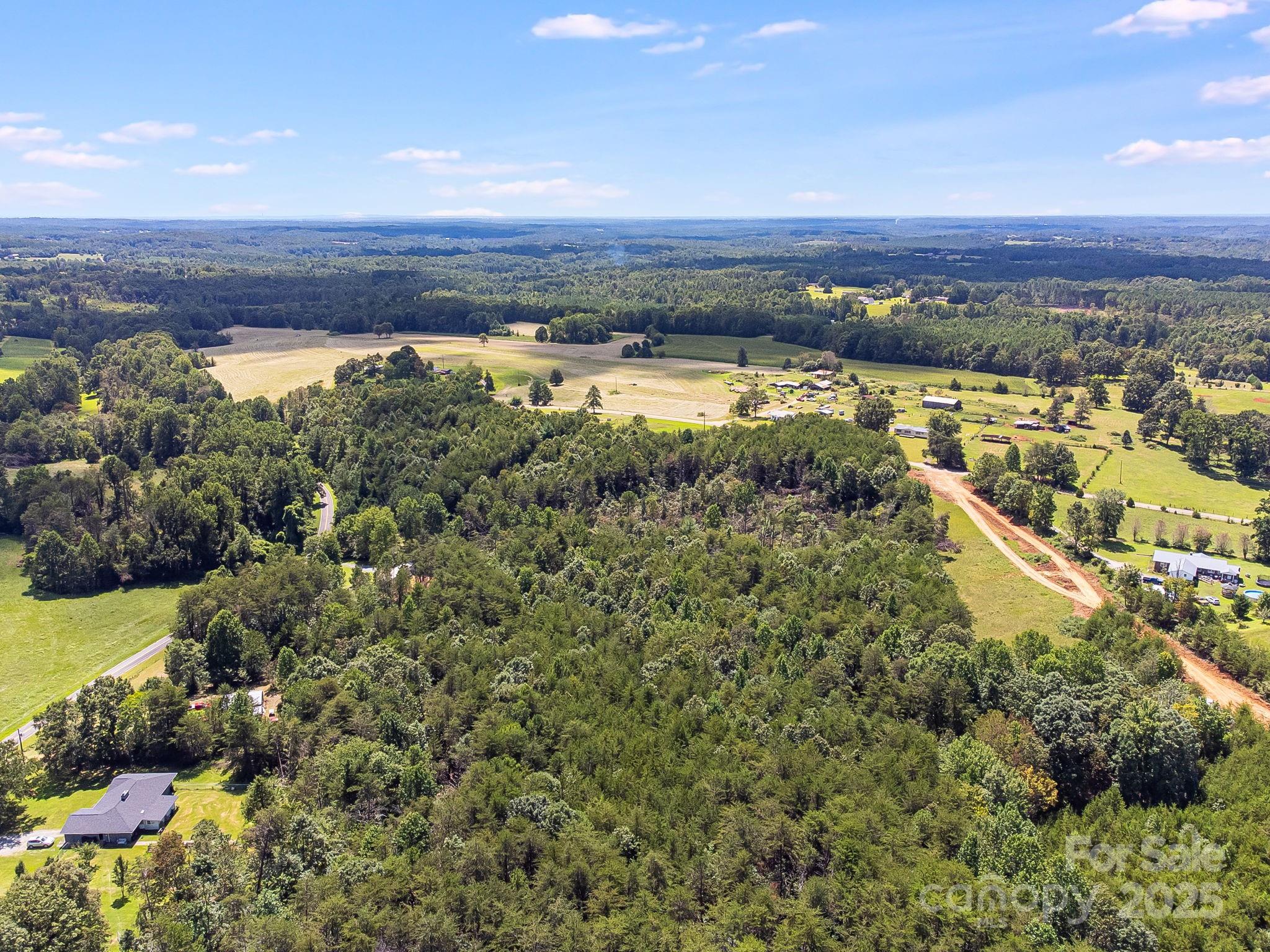 211 Luckadoo Road Bostic, NC 28018 - Photo 15 of 32 a view of a city with ocean view
