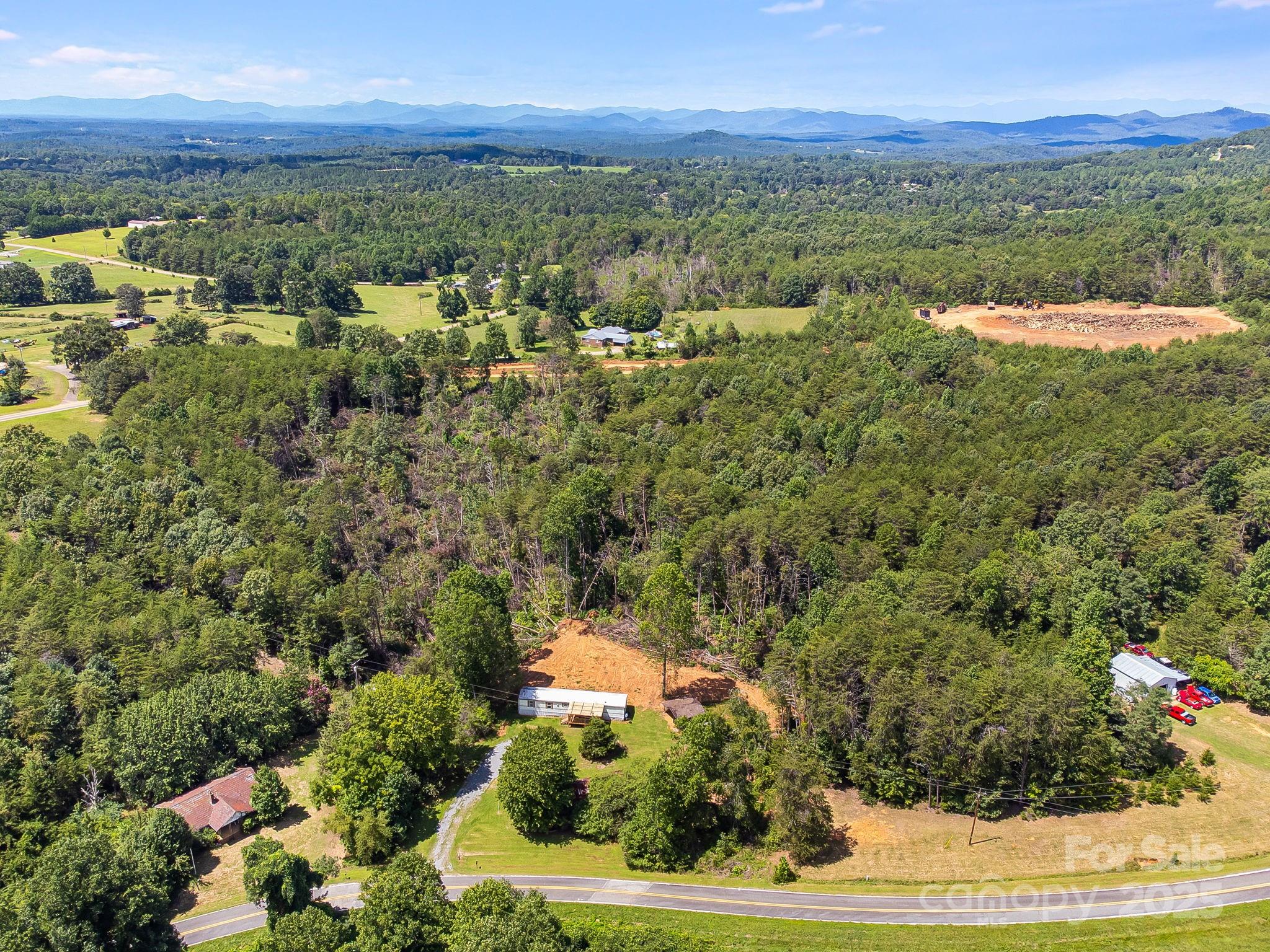 211 Luckadoo Road Bostic, NC 28018 - Photo 16 of 32 a view of a city with an outdoor space