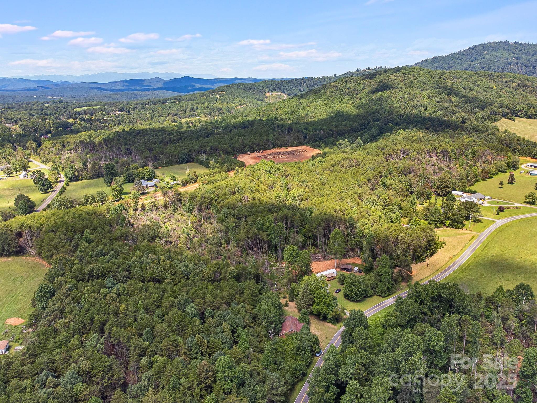 211 Luckadoo Road Bostic, NC 28018 - Photo 18 of 32 a view of lake with mountain