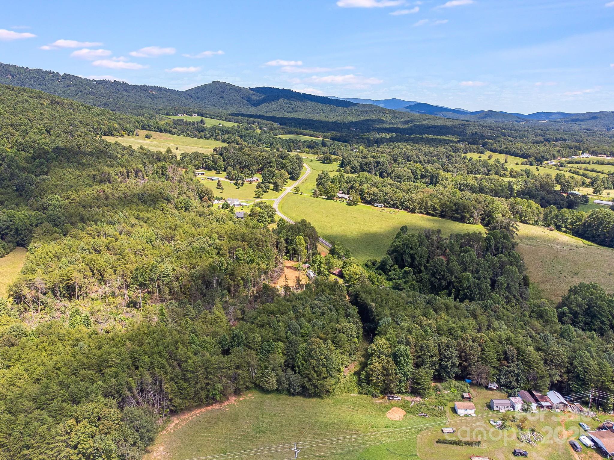 211 Luckadoo Road Bostic, NC 28018 - Photo 20 of 32 a view of lake and mountain