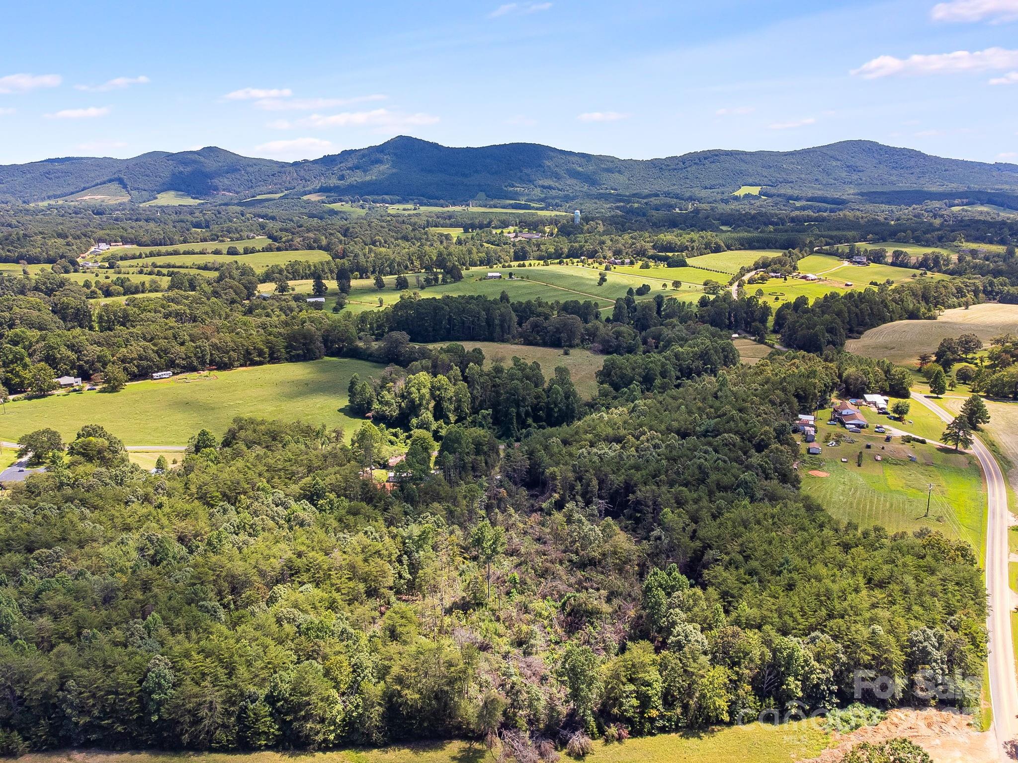 211 Luckadoo Road Bostic, NC 28018 - Photo 22 of 32 a view of lake and mountain