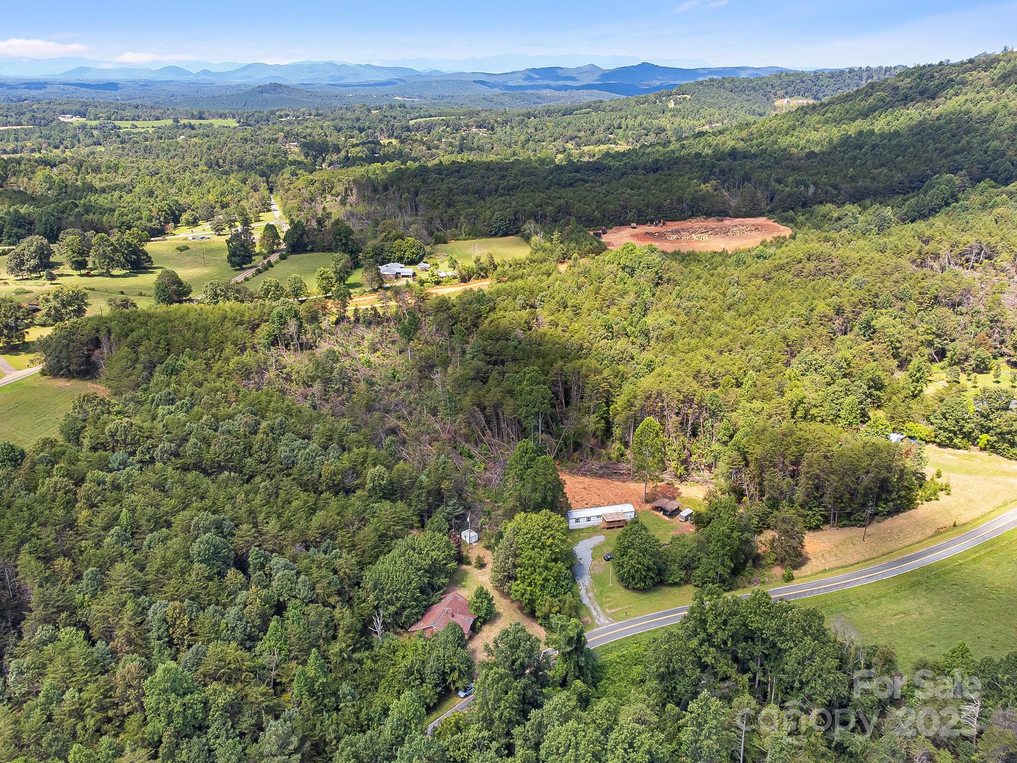 211 Luckadoo Road Bostic, NC 28018 - Photo 26 of 32 a view of lake with mountain