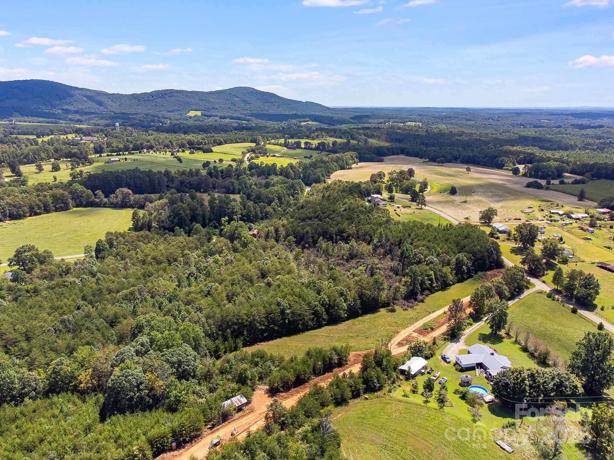 211 Luckadoo Road Bostic, NC 28018 - Photo 4 of 32 a view of a city with an ocean