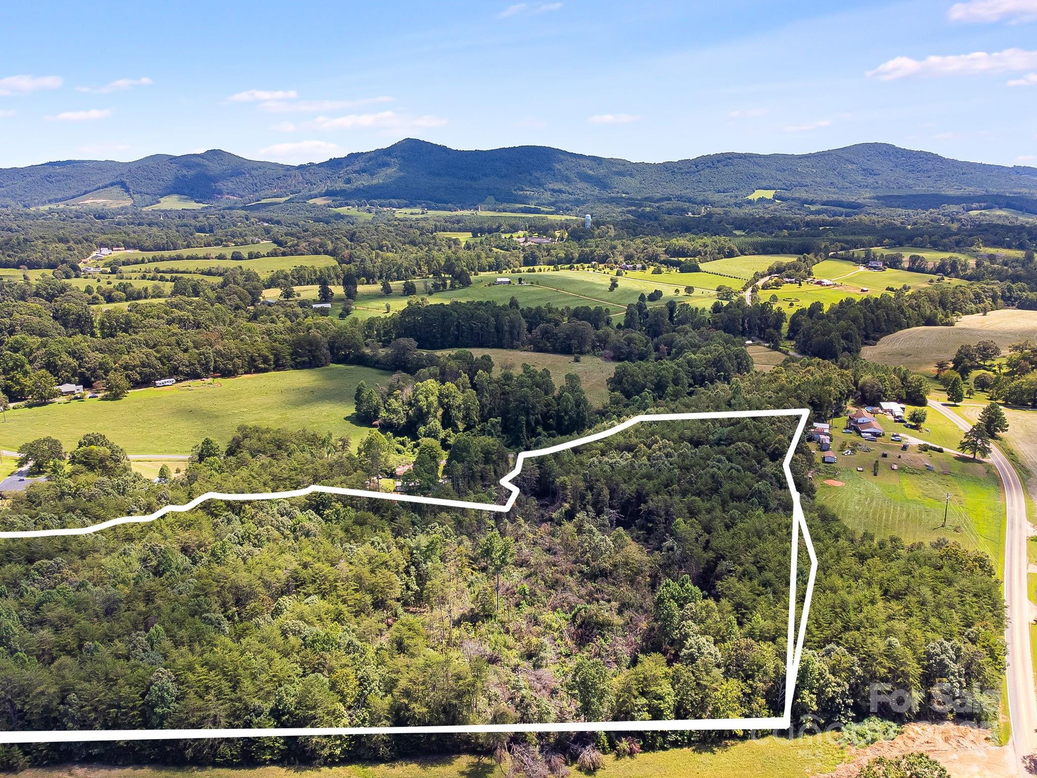 211 Luckadoo Road Bostic, NC 28018 - Photo 6 of 32 a view of an ocean and city