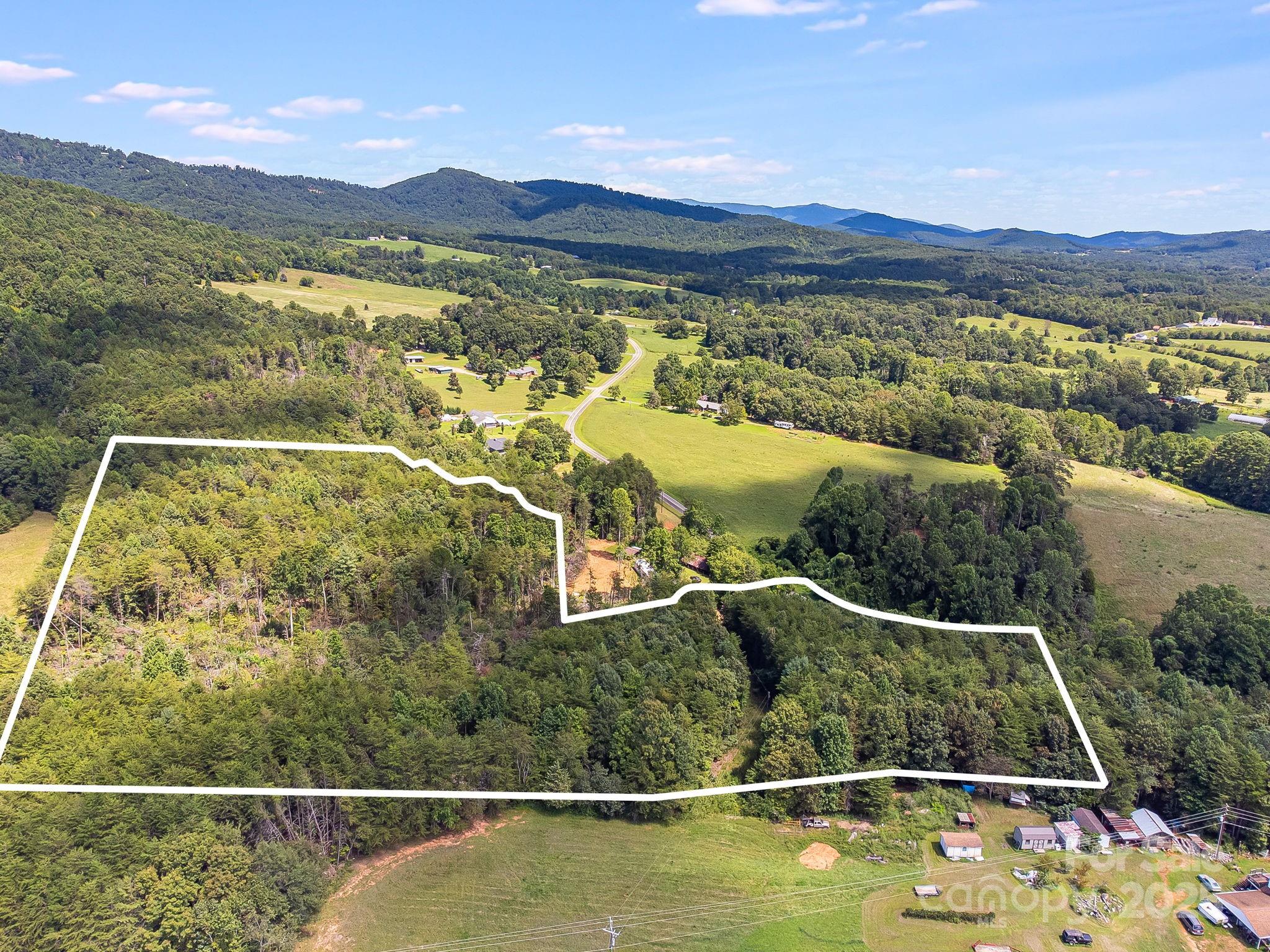 211 Luckadoo Road Bostic, NC 28018 - Photo 7 of 32 a view of a swimming pool with a balcony