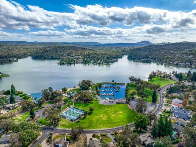 a view of a lake with a yard