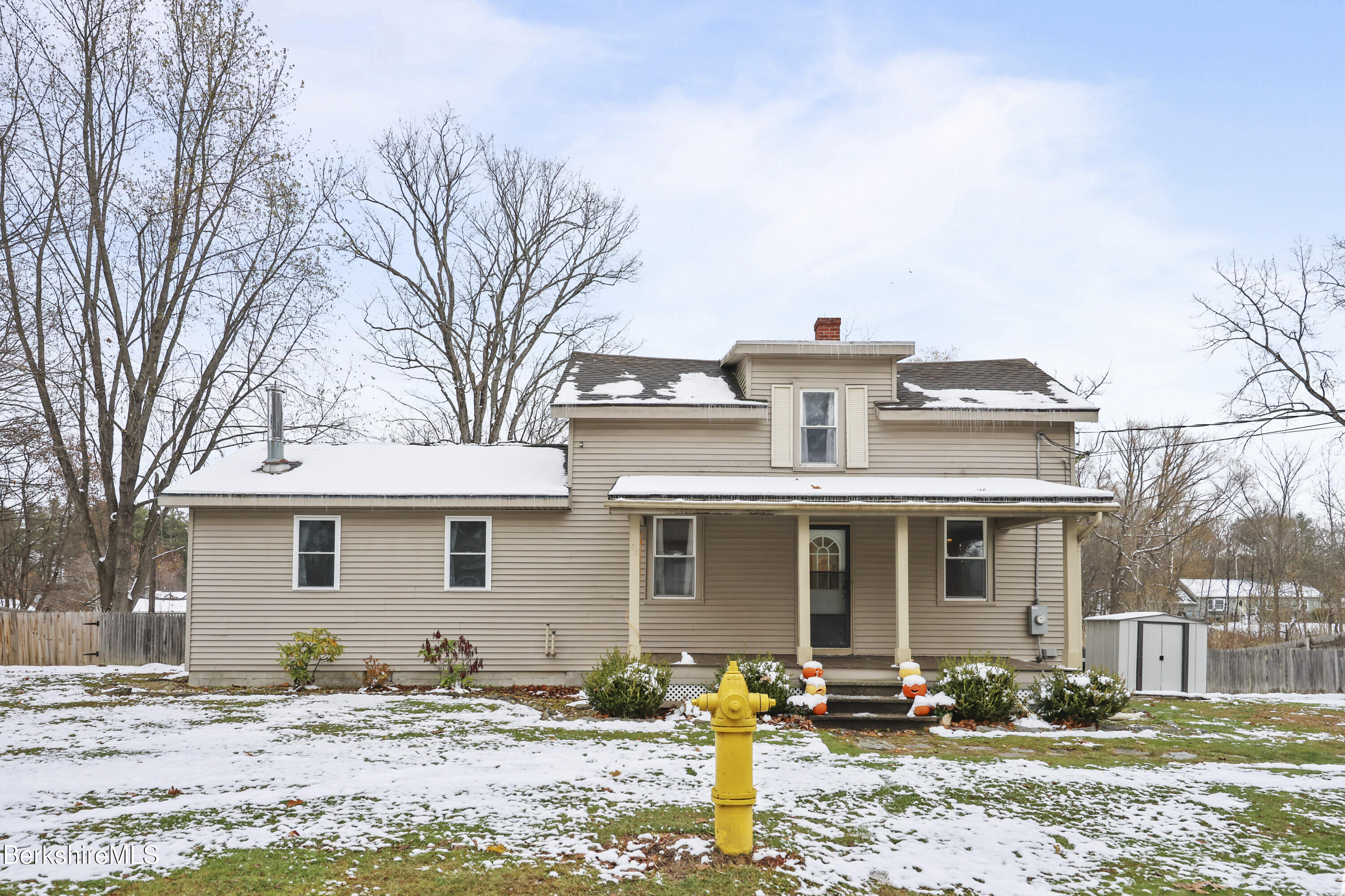 55 Newton Avenue Pittsfield, MA 01201 - Photo 1 of 30 a front view of a house with parking yard