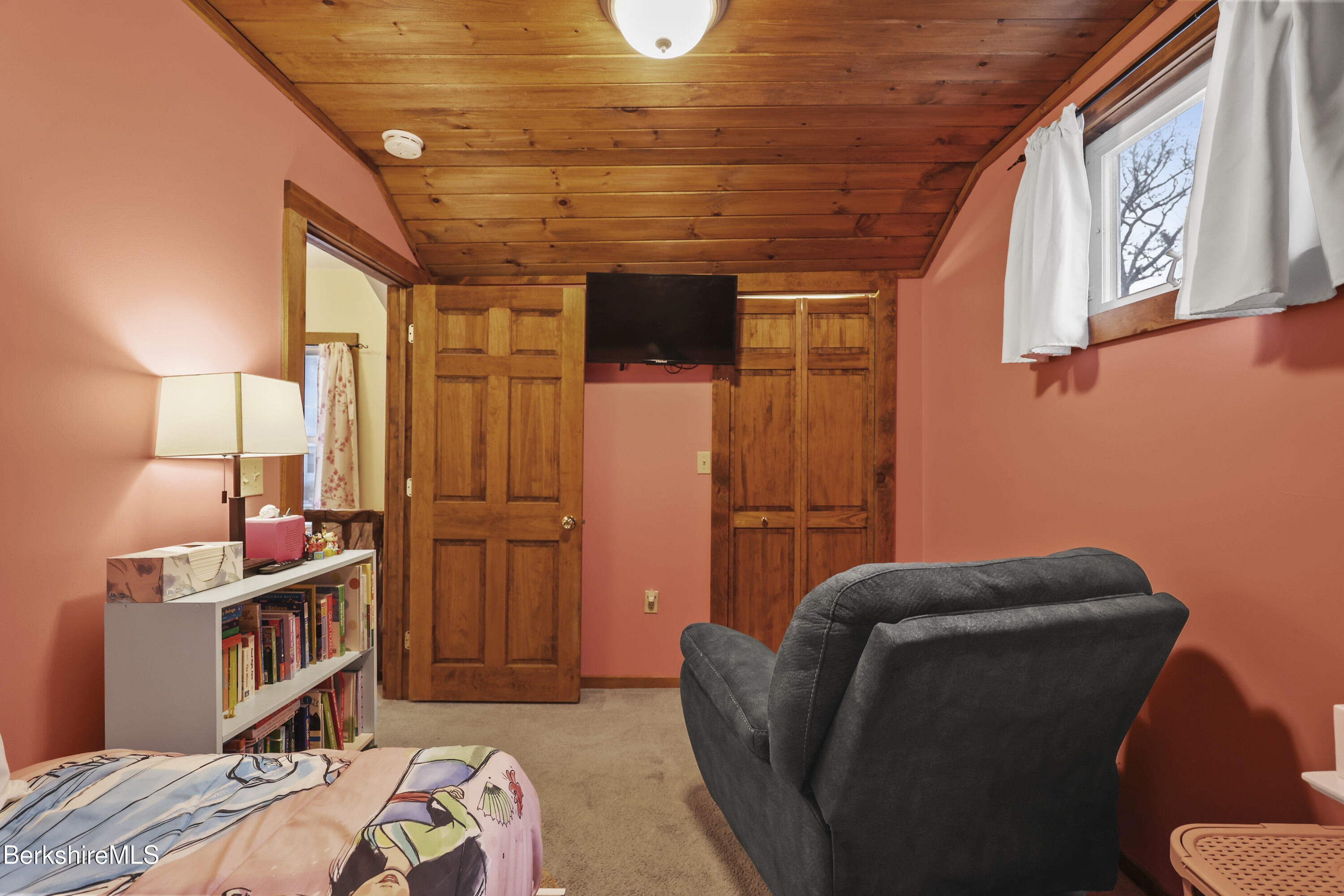55 Newton Avenue Pittsfield, MA 01201 - Photo 21 of 30 a bed room with a bed and a window