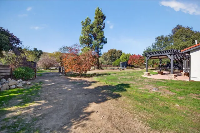 a view of a park with swings and slides