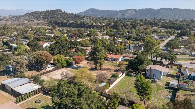 an aerial view of residential house with outdoor space