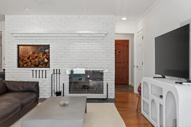 a view of livingroom with furniture and fireplace