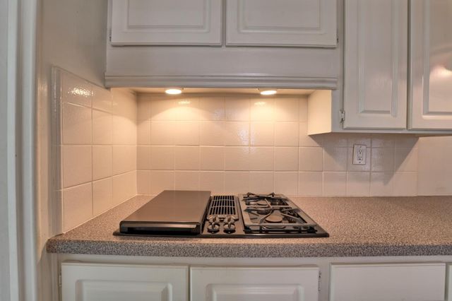 a kitchen with a stove