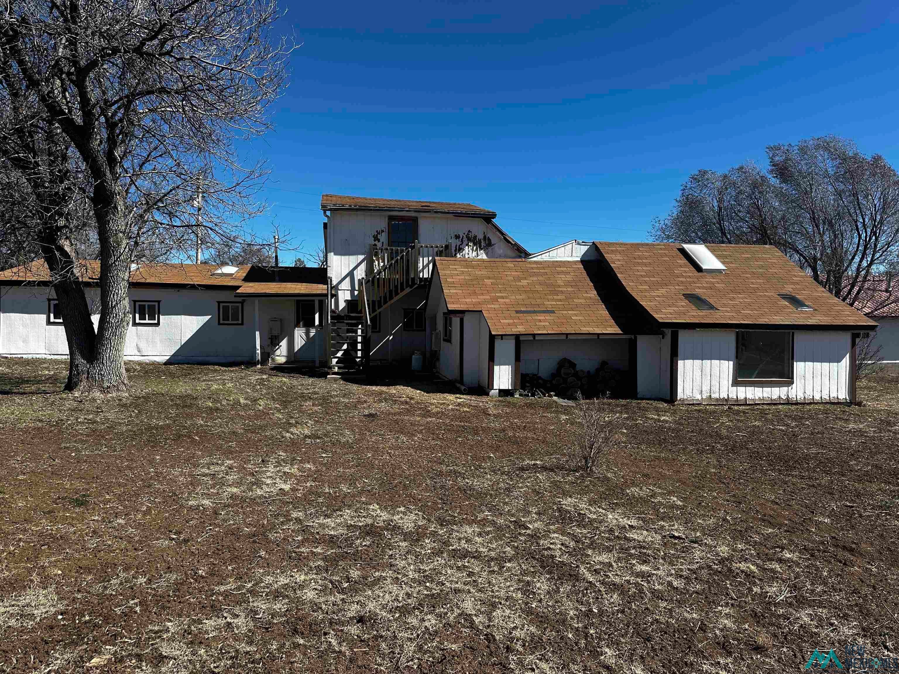31 Bill Knight Gap Road Luna, NM 87824 - Photo 38 of 41 View of front of house featuring a deck and roof with shingles