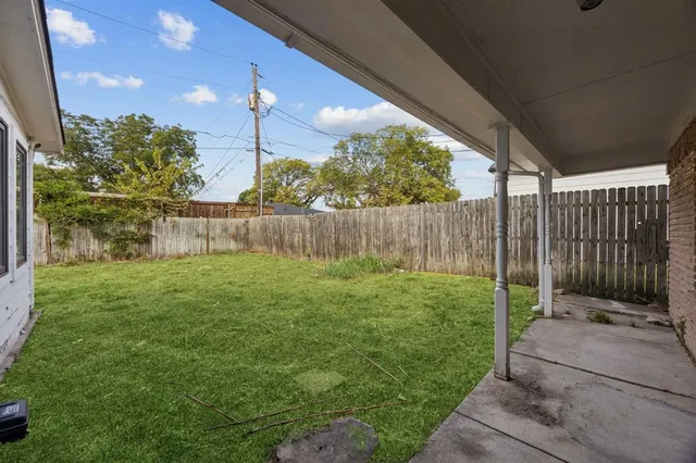 a view of a backyard with a garden