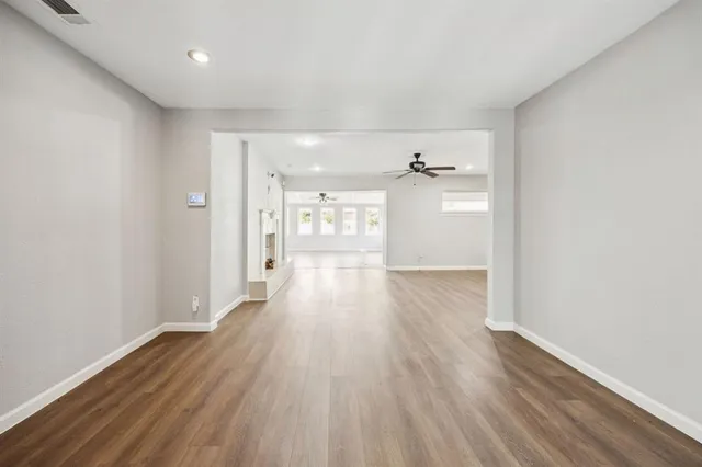 a empty room with wooden floor