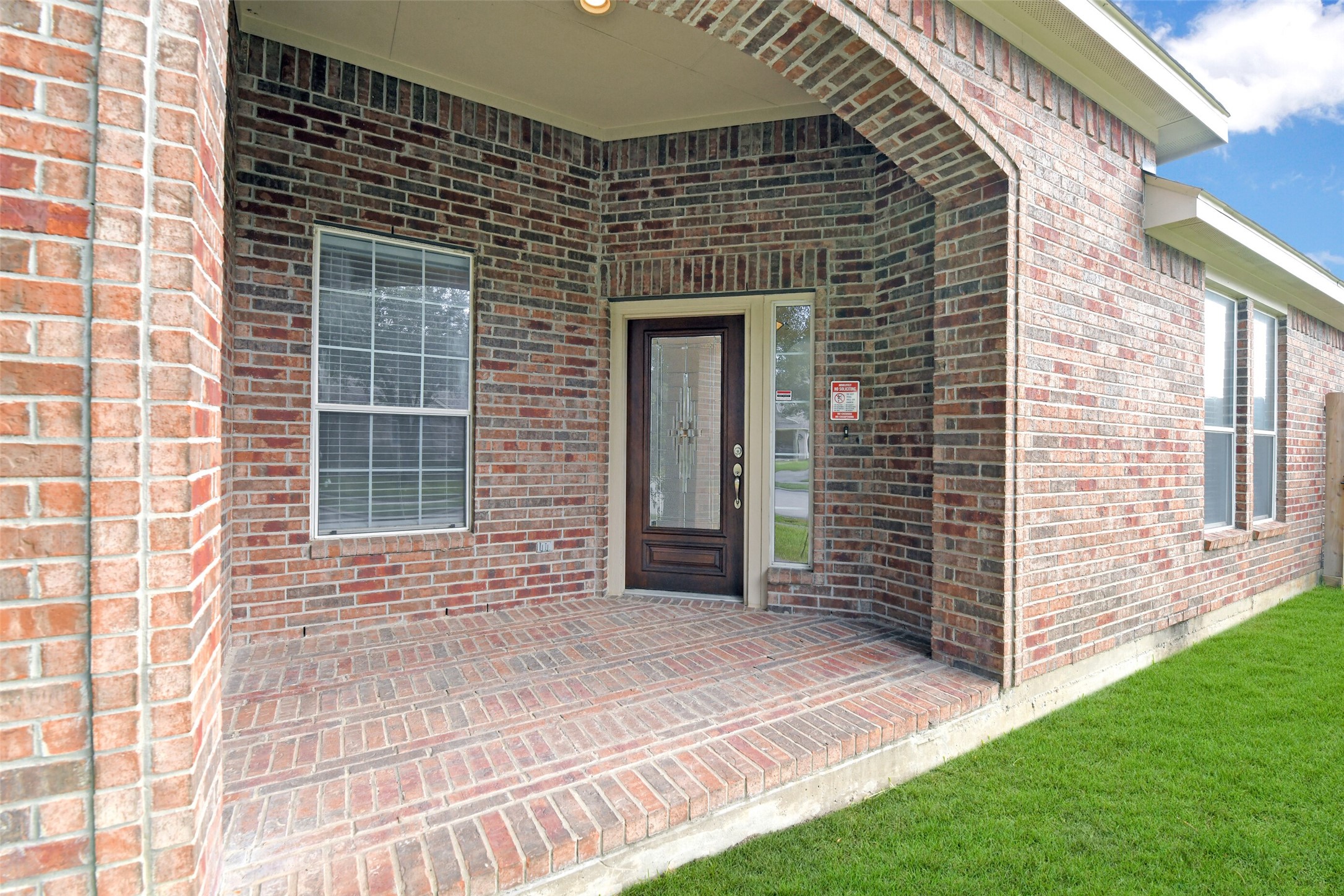 19227 Countryhills Court Spring, TX 77388 - Photo 5 of 33 Inviting covered front porch. Elevate your entrance with this elegant leaded glass door, offering both style and sophistication.