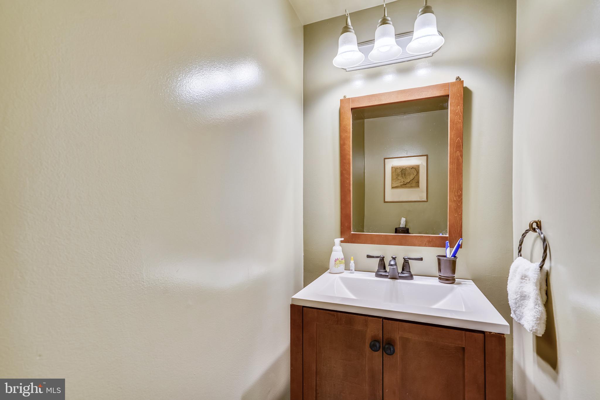 11087 Saffold Way Reston, VA 20190 - Photo 20 of 48 Half Bath on the Main Level.