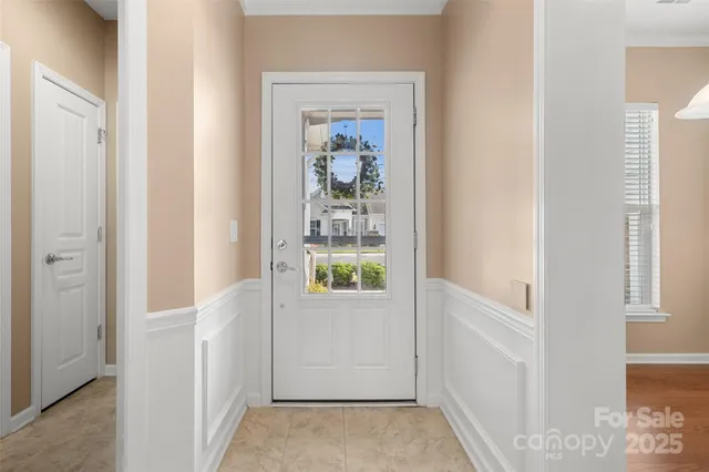 a view of a bedroom from a hallway