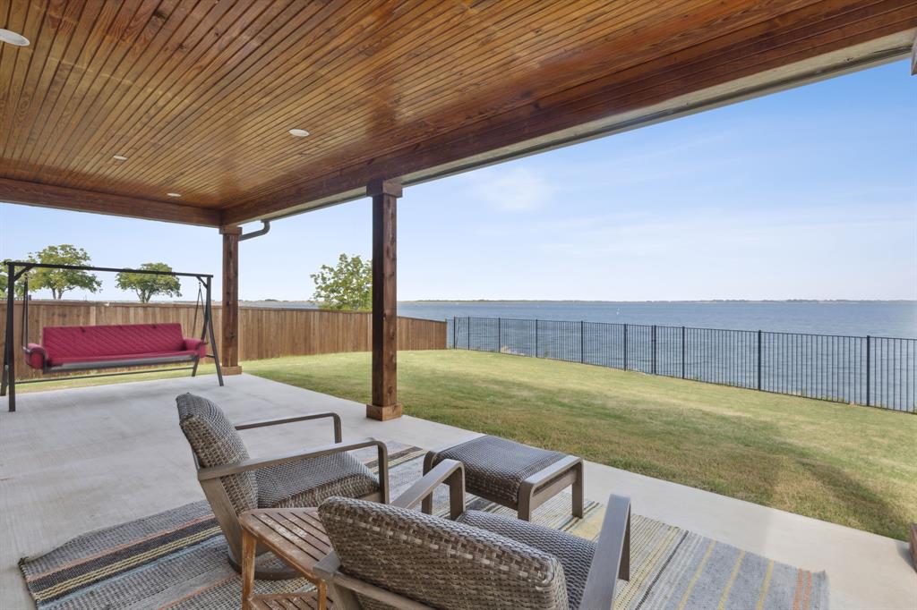 a view of yard with patio
