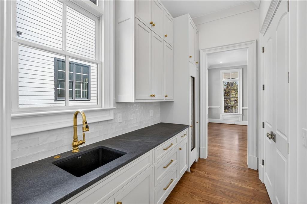 2147 Cooper Lake Road Southeast Smyrna, GA 30080 - Photo 12 of 65 a kitchen with a sink and cabinets