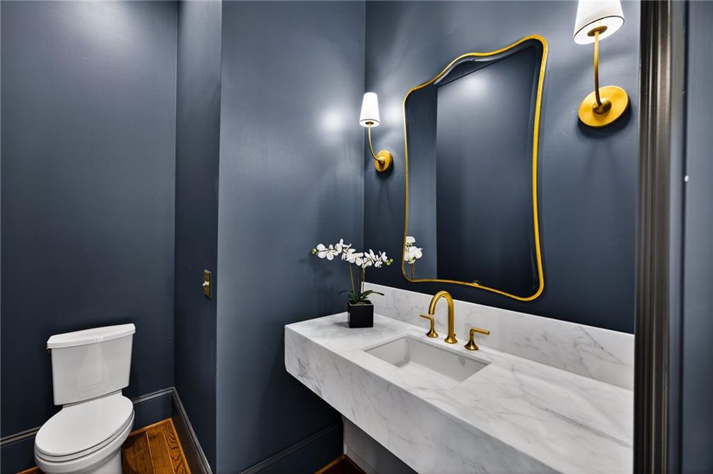 2147 Cooper Lake Road Southeast Smyrna, GA 30080 - Photo 19 of 65 a bathroom with a sink and a mirror